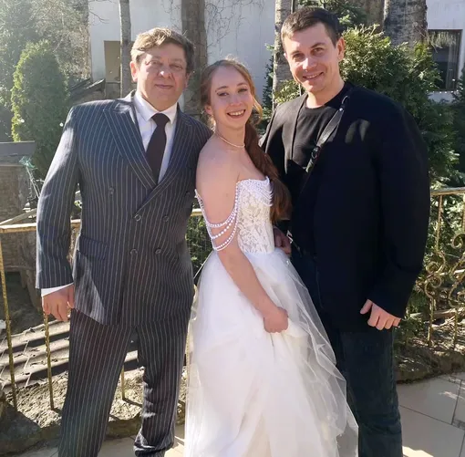 Дмитрий Брекоткин с дочерью и фотографом