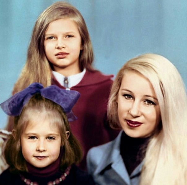 Little Evelina Bledans with her mother Tamila and her sister Maya