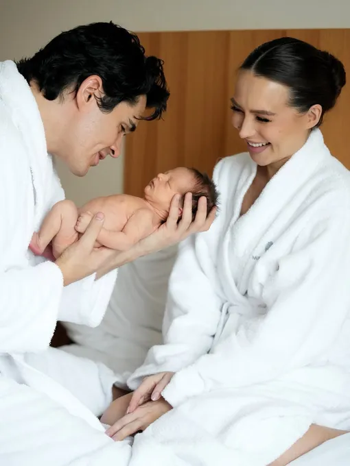 Луис Сквиччиарини и Лерчек с новорожденным сыном