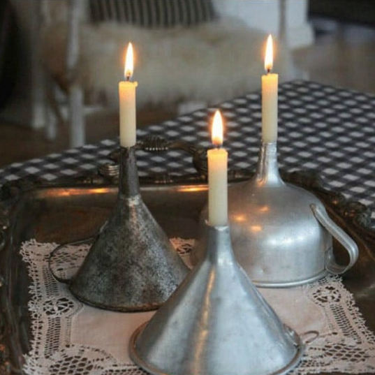 Candlestick from an old funnel