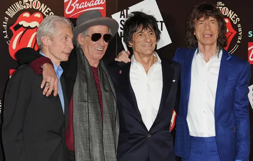 Чарли Уоттс (крайний слева) с участниками группы Rolling Stones Чарли Уоттс (крайний слева) с участниками группы Rolling Stones