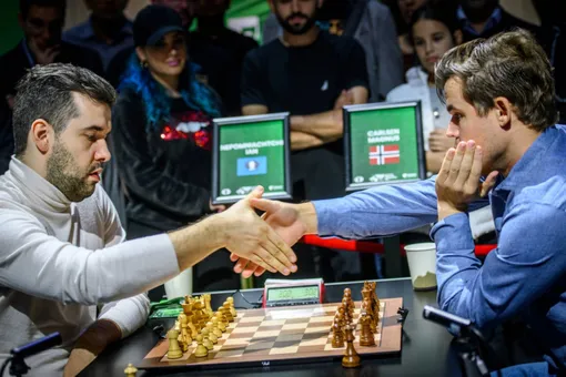 Ян Непомнящий и Магнус Карлсен разделили титул чемпиона мира