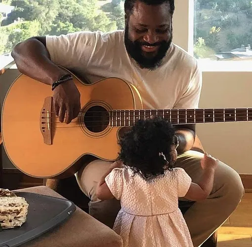 Мальколм-Джамал Уорнер с дочерью