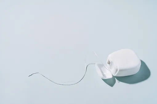 как пользоваться зубной нитью