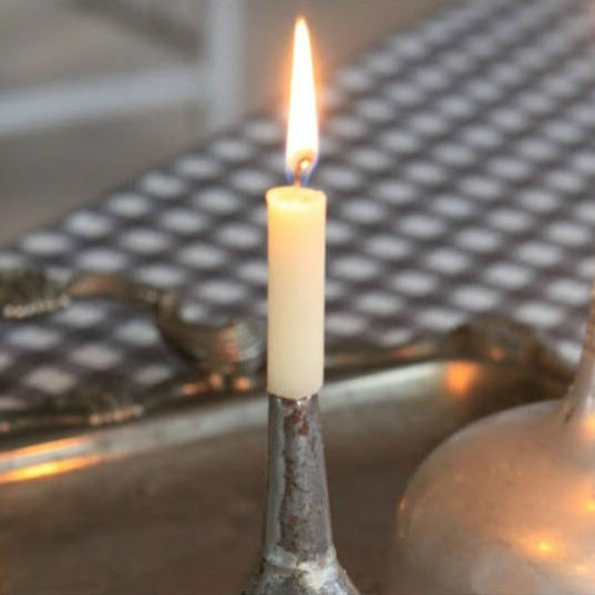 Candlestick from an old funnel