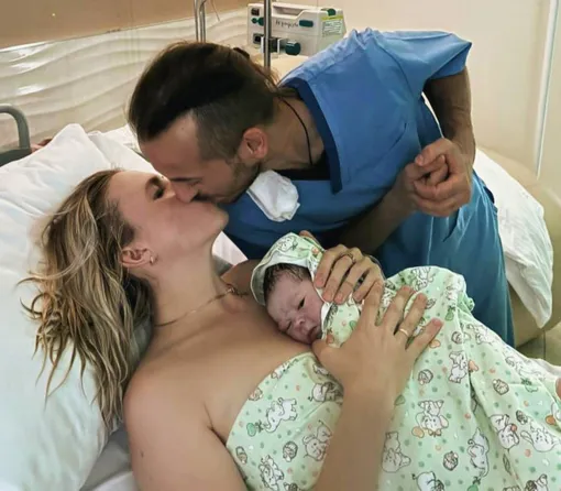 Дарья Могучая с мужем и новорожденным